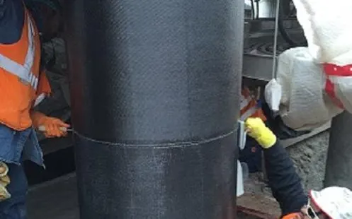 Carbon fibre wrapping and CFRP strengthening of a column