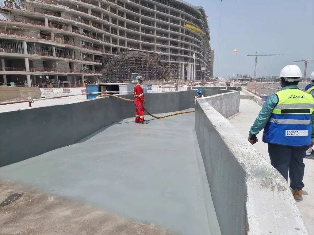Waterproofing coating applied to a terrace slab and upstands